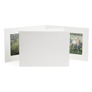 White horizontal photo folder that's dimpled like a golf ball.