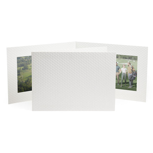 White horizontal photo folder that's dimpled like a golf ball.