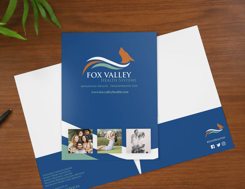 Blue pocket folder with healthcare logo and branding printed on the cover and pockets.