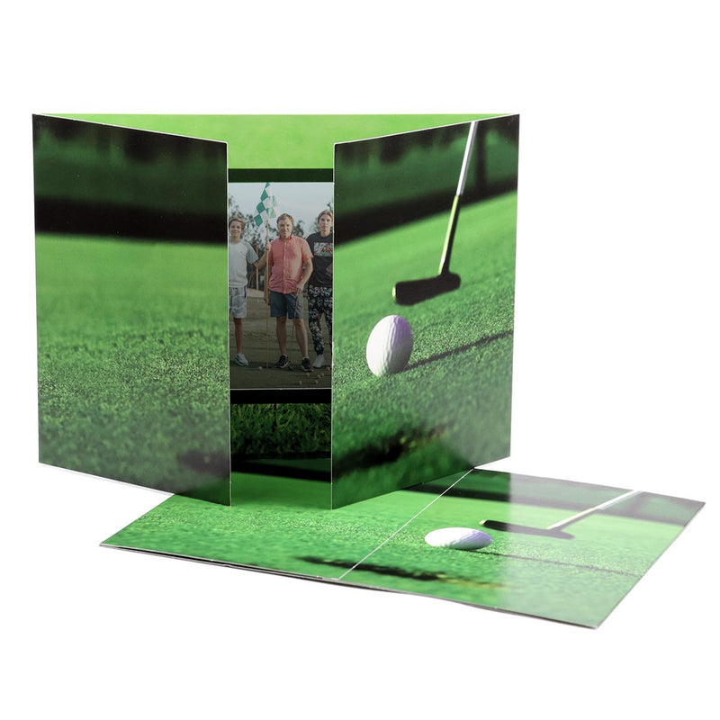 Horizontal photo folder with golf course design has barn door style flaps.