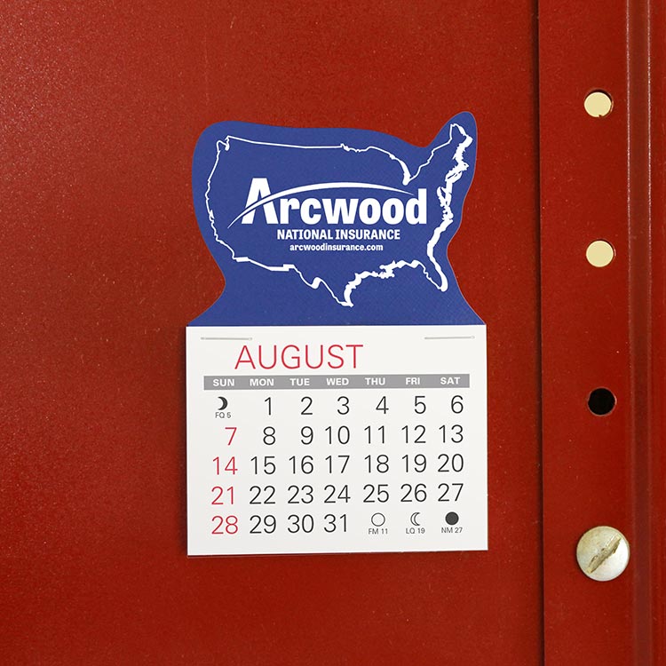 USA-shaped blue calendar with insurance company logo foil stamped in white above the calendar pad