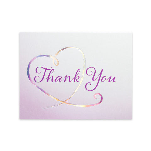 Horizontal greeting card with pastel purple gradient background, a purple script Thank You text, and a holographic silver foil heart circling part of the text.