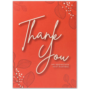 Red business thank you card with leaf and berry design accents