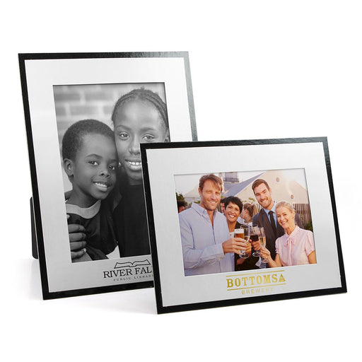 Horizontal and vertical frames have white fronts and black backs. Each has a logo imprinted below the picture frame window.