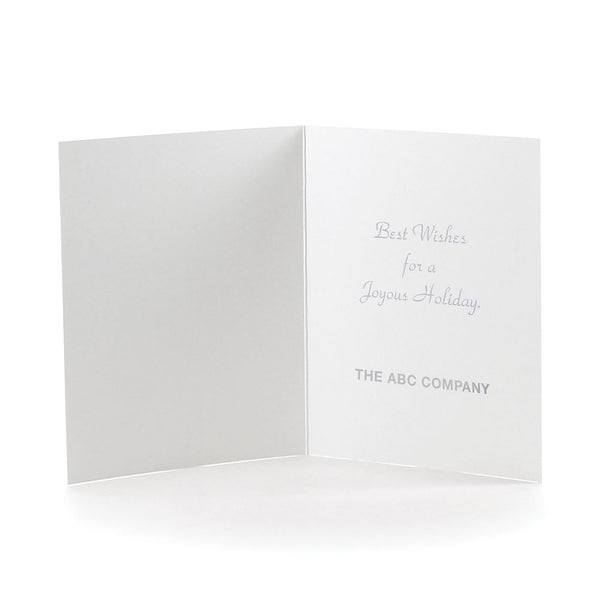 Christmas card sentiment and company logo imprinted in silver foil