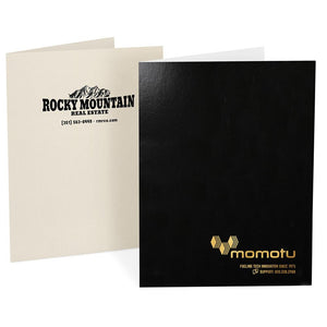 Ivory and black pocket folders, each with a company logo stamped on the front covers