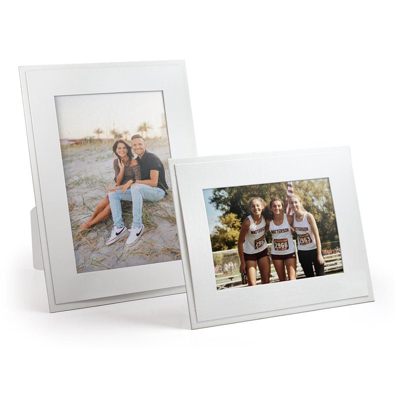 Blank white glossy cardboard frames in horizontal and vertical formats.