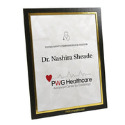Glossy black vertical certificate frame with gold foil border and logo imprint.