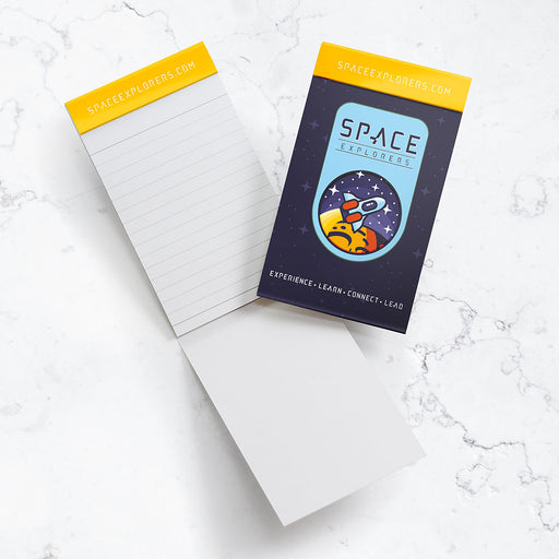 Pocket jotter with a space camp design on the cover.