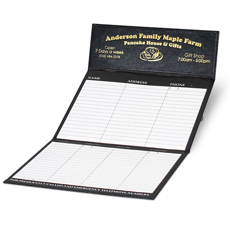 Black promotional desk calendar with gold foil logo imprint and flip-out phone index