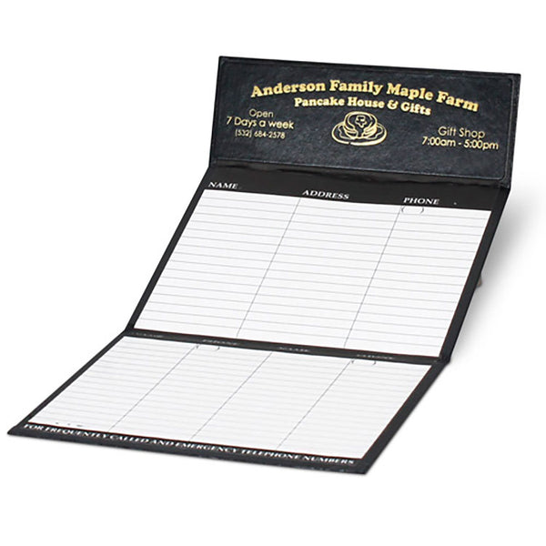 Black promotional desk calendar with gold foil logo imprint and flip-out phone index
