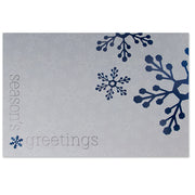 Silver holiday card with blue foil snowflake design