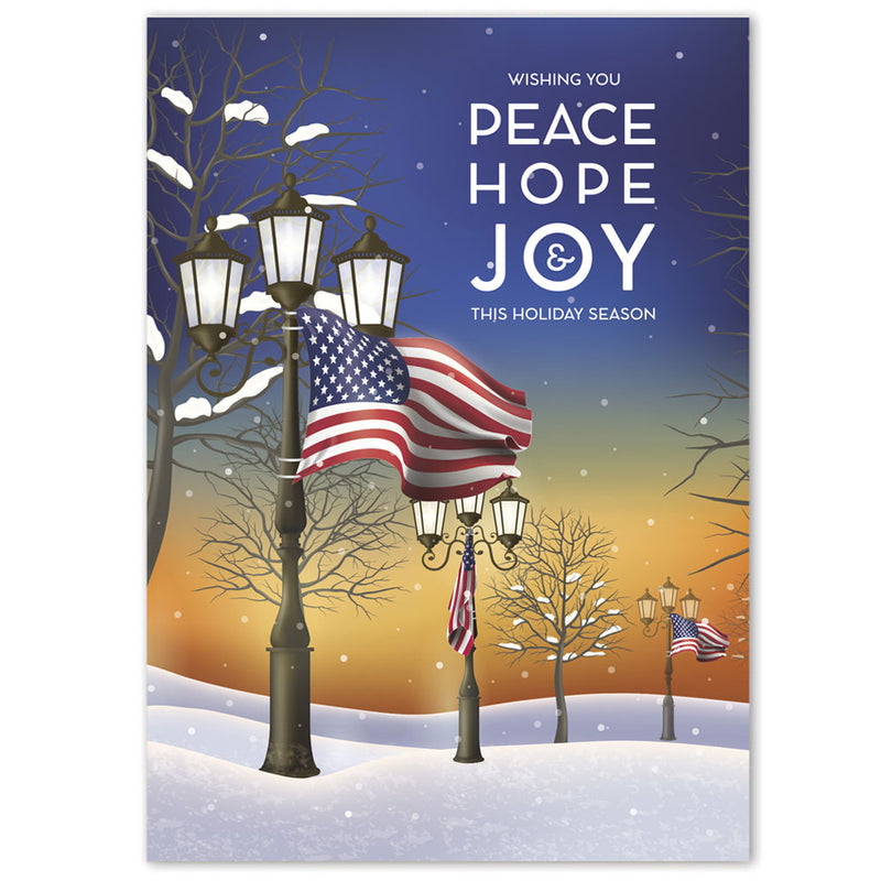 Christmas cards with snow-covered street scene at dusk with American flags