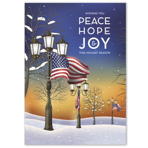 Christmas cards with snow-covered street scene at dusk with American flags