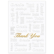 White greeting card with embossed and gold foil thank you design in various languages