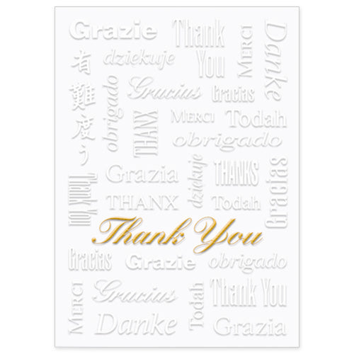 White greeting card with embossed and gold foil thank you design in various languages
