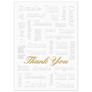 White greeting card with embossed and gold foil thank you design in various languages