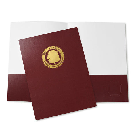 Glossy burgundy pocket folder with gold foil company logo imprint