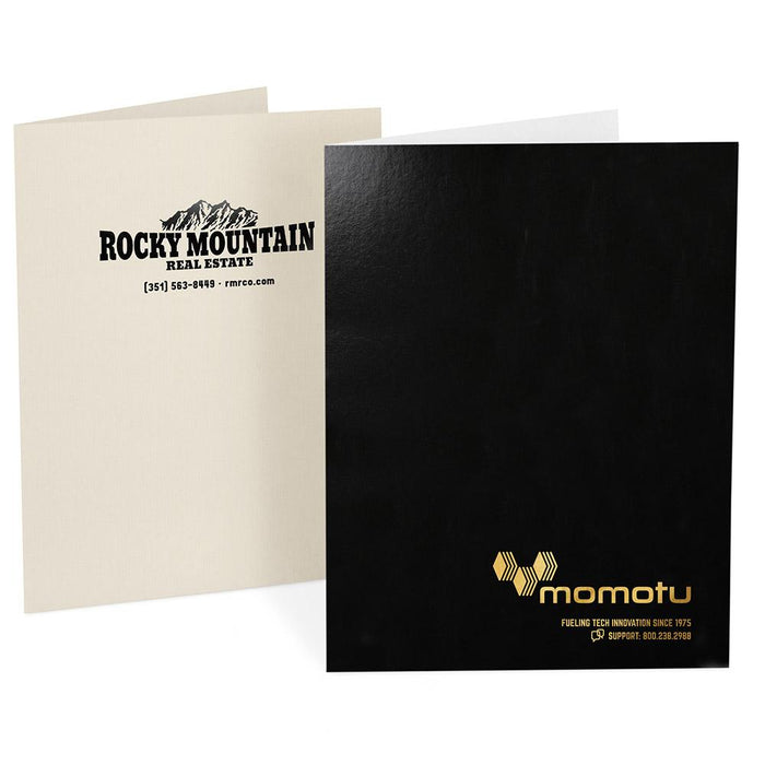 Ivory and black pocket folders, each with a company logo stamped on the front covers