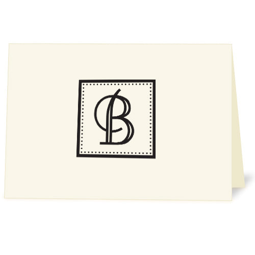 Ivory note card with metallic gblackold foil decorative monogram imprint.